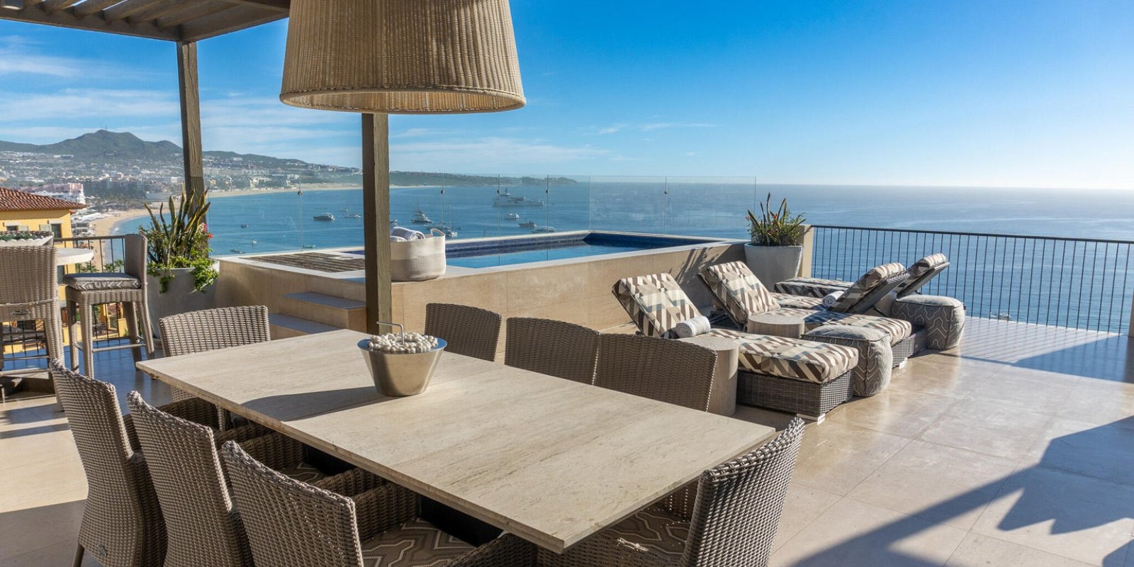 Dining on a terrace above the bay