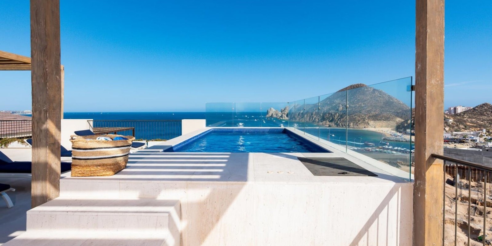 A terrace at Hacienda Beach Club looking across the bay to Land’s End, Cabo San Lucas